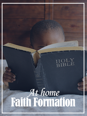 Child reading family bible with At home Faith Formation text