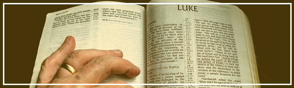 Bible turned to the first page of Luke's Gospel