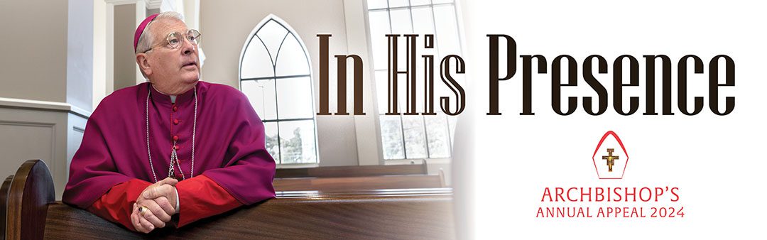 Archbishop Hartmayer kneeling in a church pew praying with the theme of this years appeal "In His Presence" beside him. Archbishop's Annual Appeal 2024