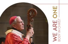 We Are One Body in Christ text is displayed on the side with Archbishop Hartmayer on the left in prayer.