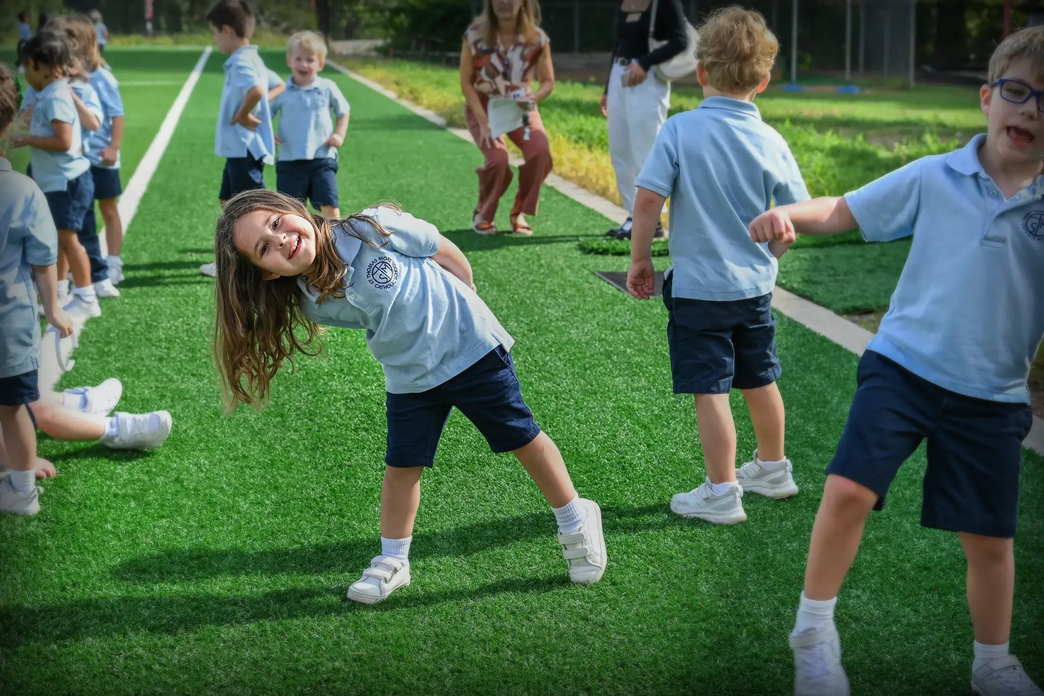 Children playing outside at Catholic school