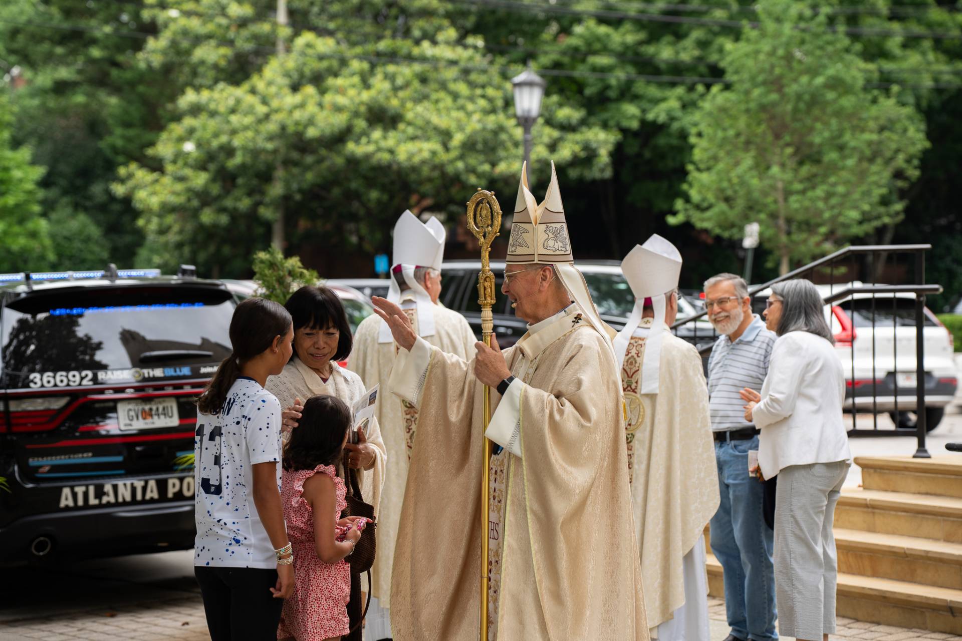 Archbishop Hartmayer blesses a group of parishioners who have attended the Provincial Mass.