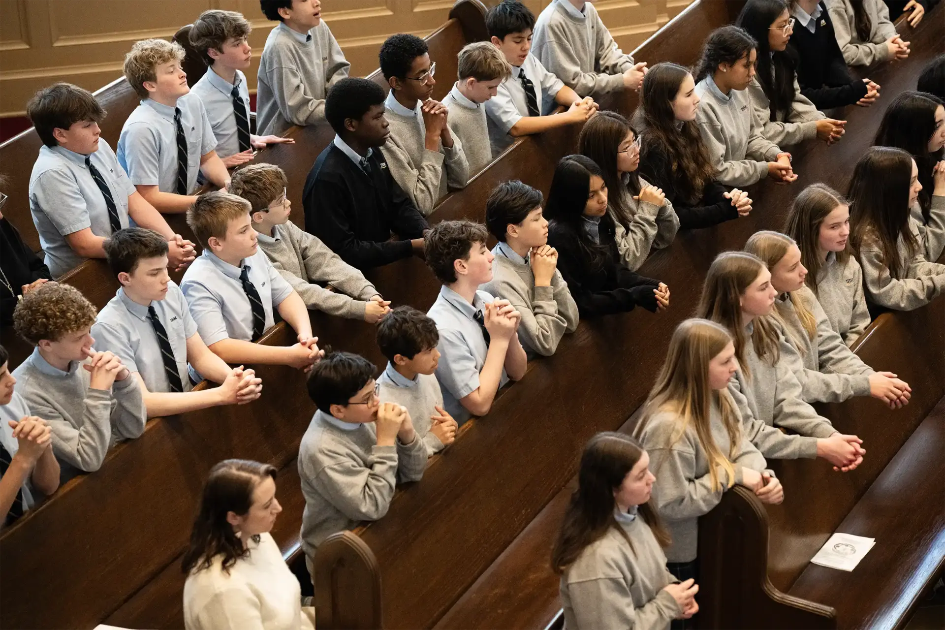 8th Grade Liturgy Students Kneeling