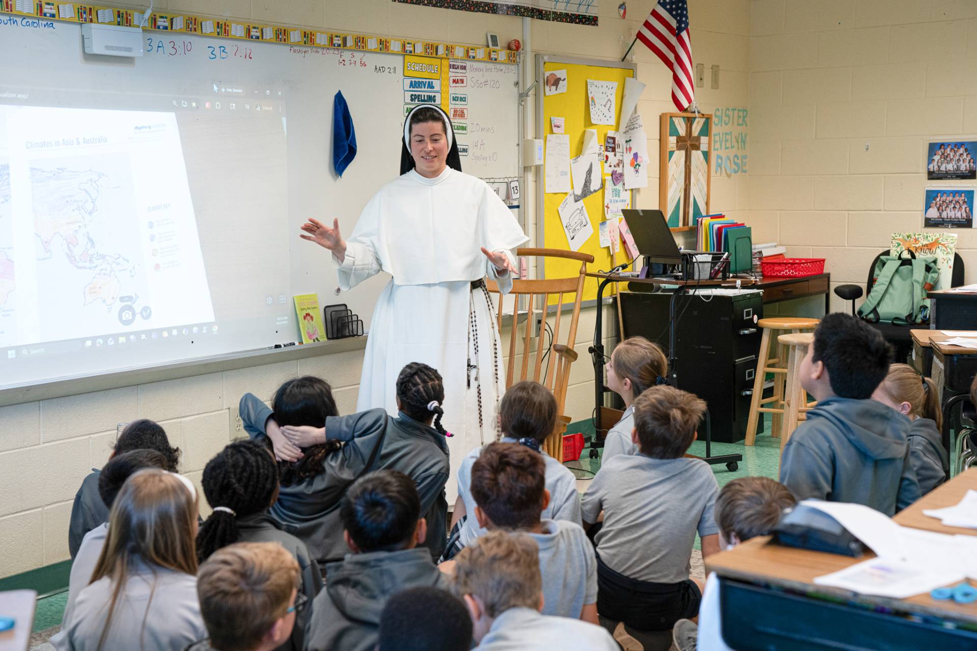Sister teaching students