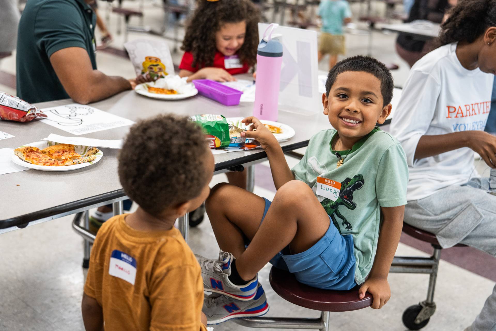 Children at St. John Neumann Catholic Church and School enjoy a pizza party.
